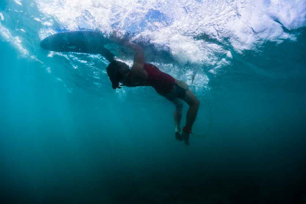 Perfect example of surfing's turtle roll